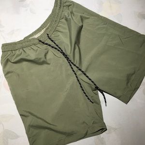 Workout shorts/ swimsuit with cellphone pocket.